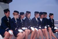 The SRN4 with Seaspeed in Calais - Stewardesses posing on the roof (Pat Lawrence).
